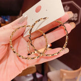 UNI-10092 - Twisted Hoop Gold - Earring